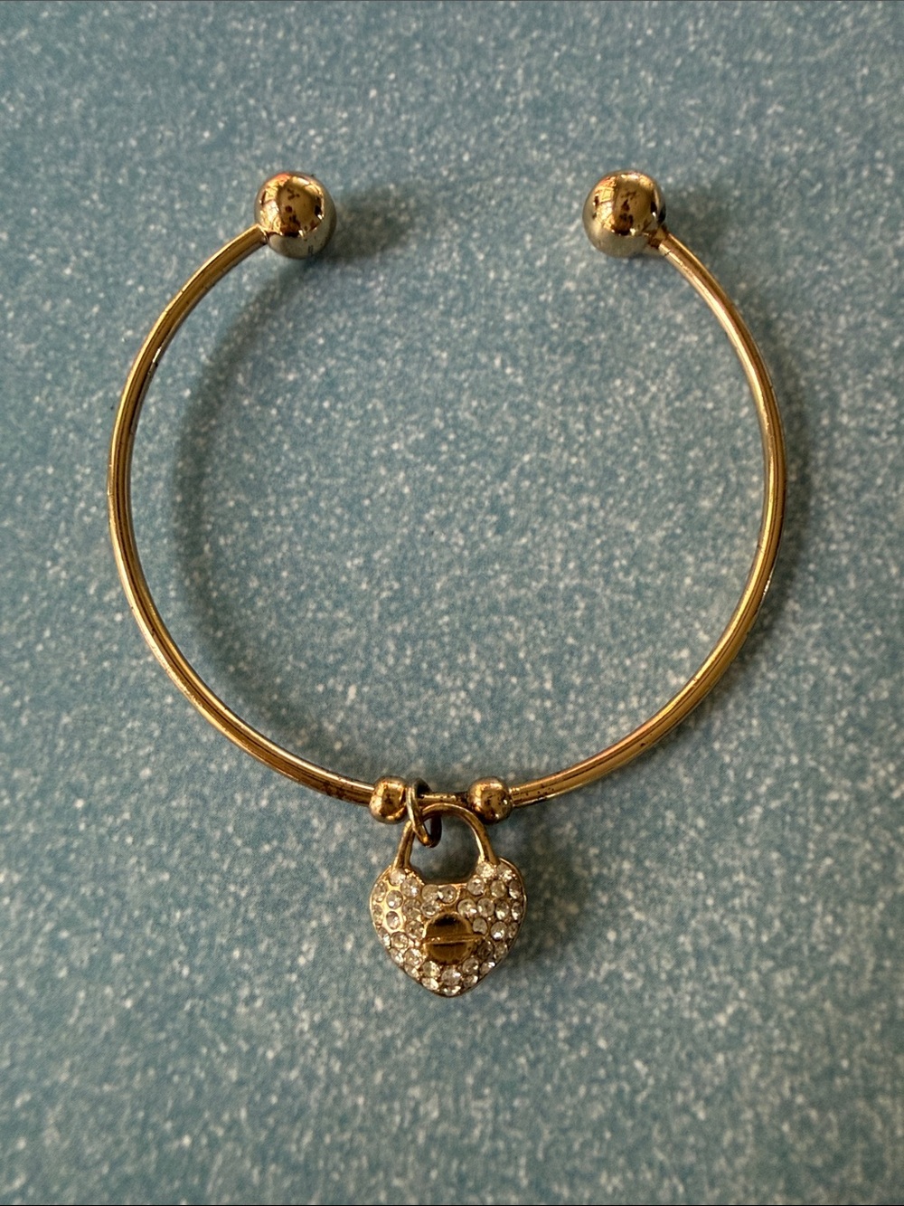 Gold bracelet with heart